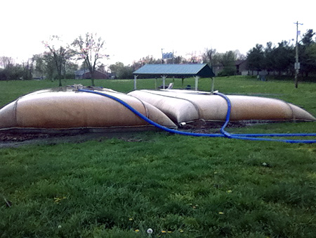 Geotextile tubes filling up on a job site in Lexington, KY.